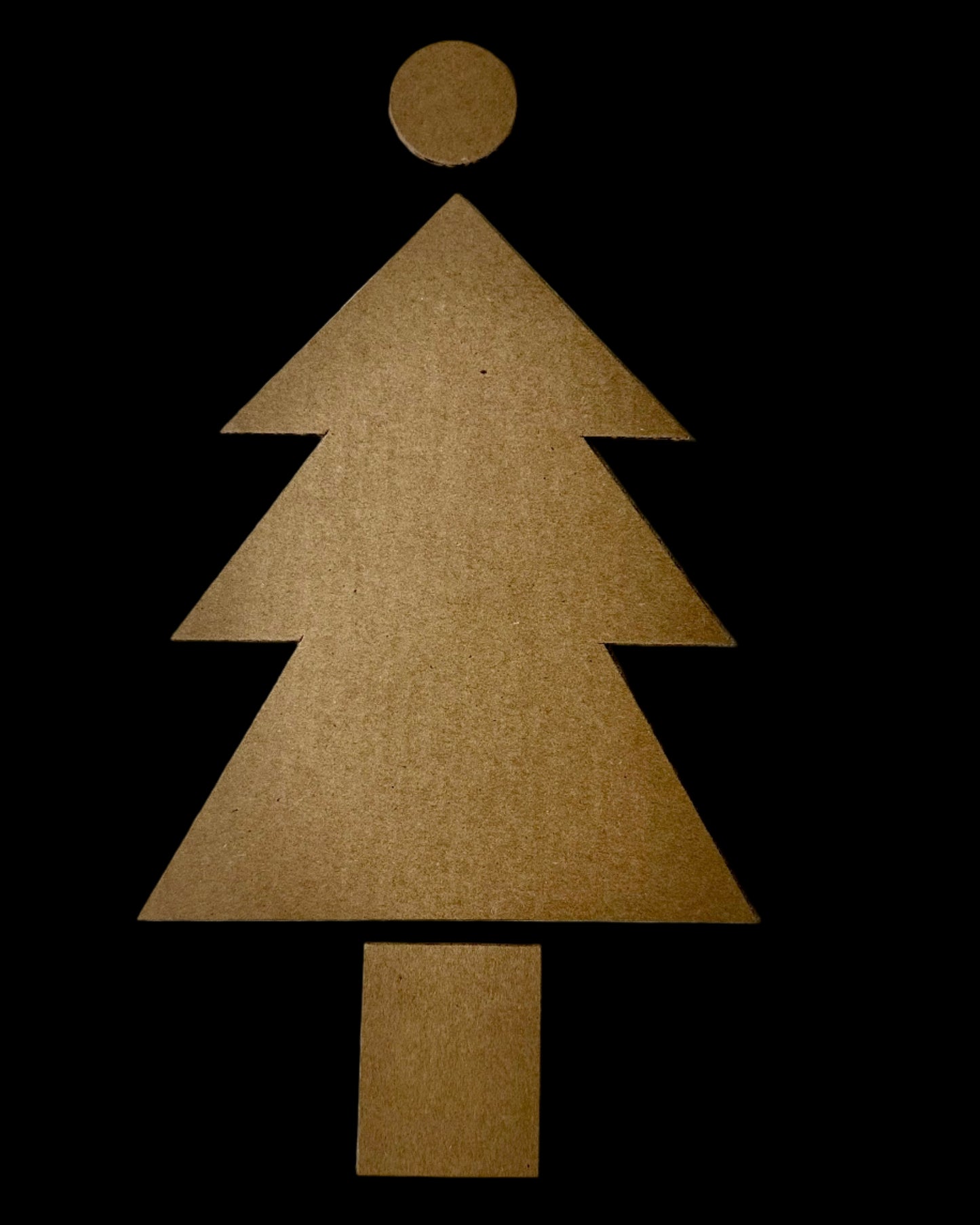 Cardboard cutout of Christmas tree kit.